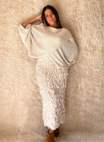 Falda punto flecos beige