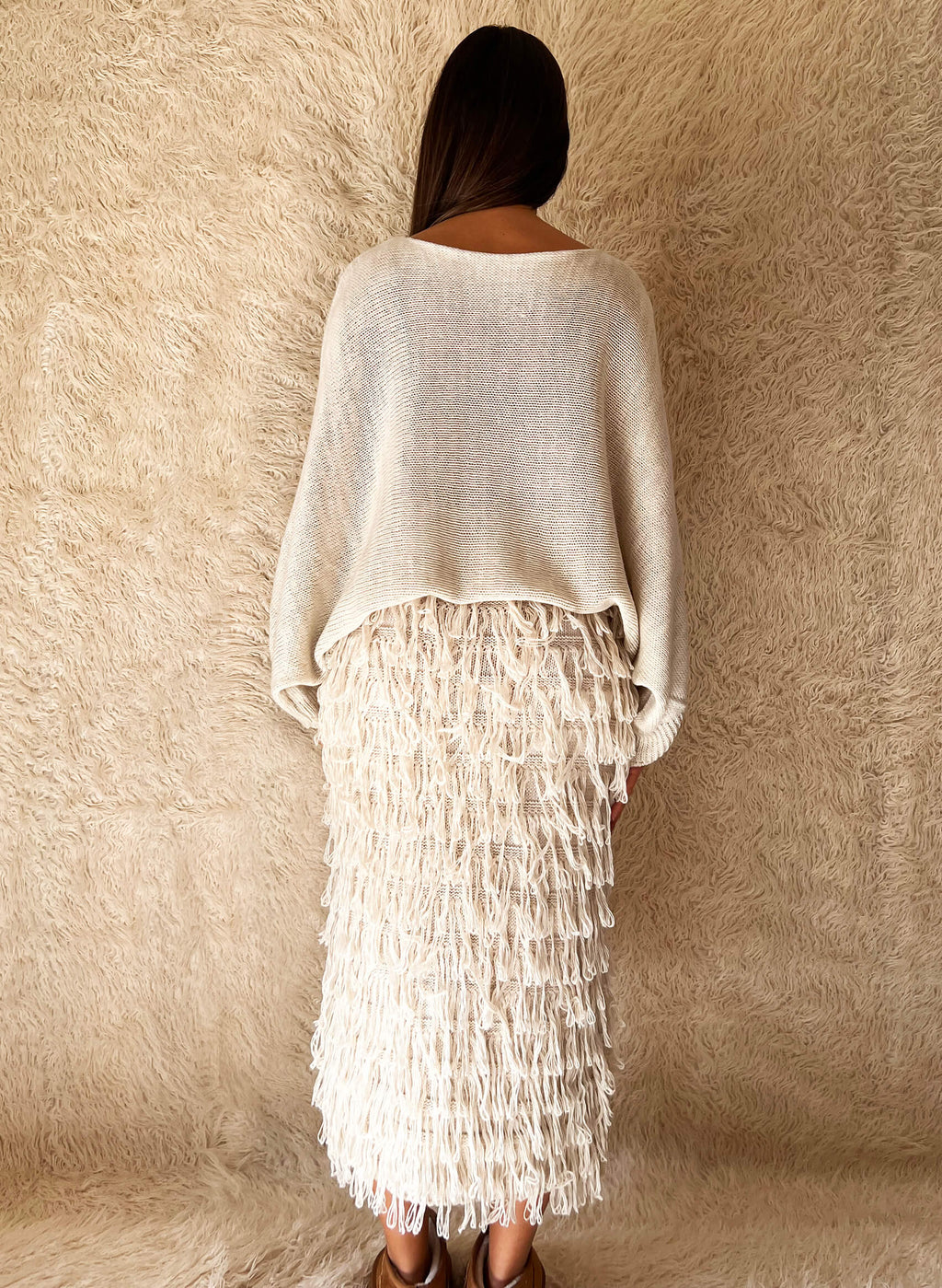 Falda punto flecos beige