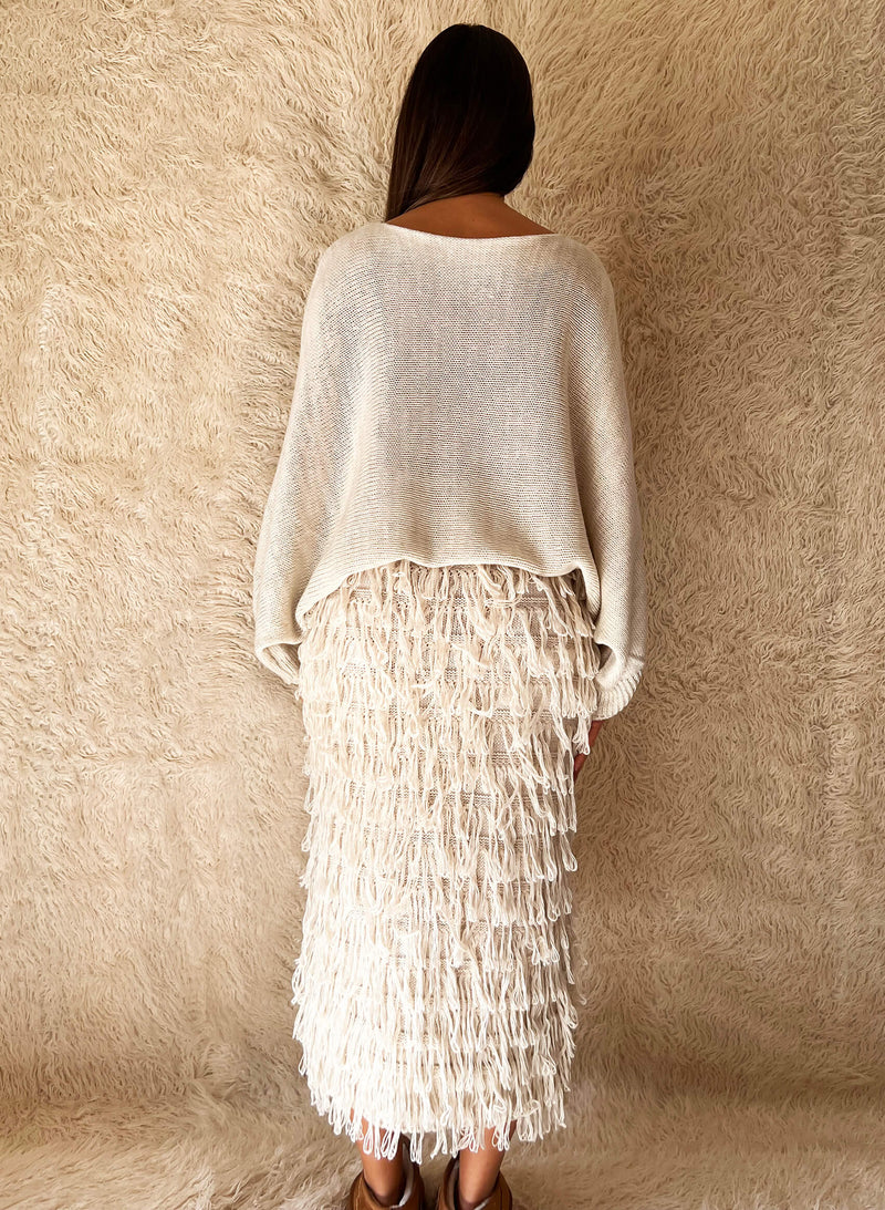 Falda punto flecos beige