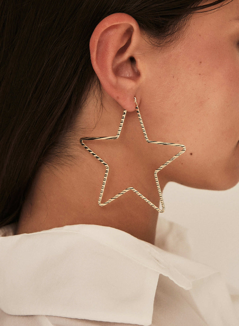 Pendientes maxi estrella acero