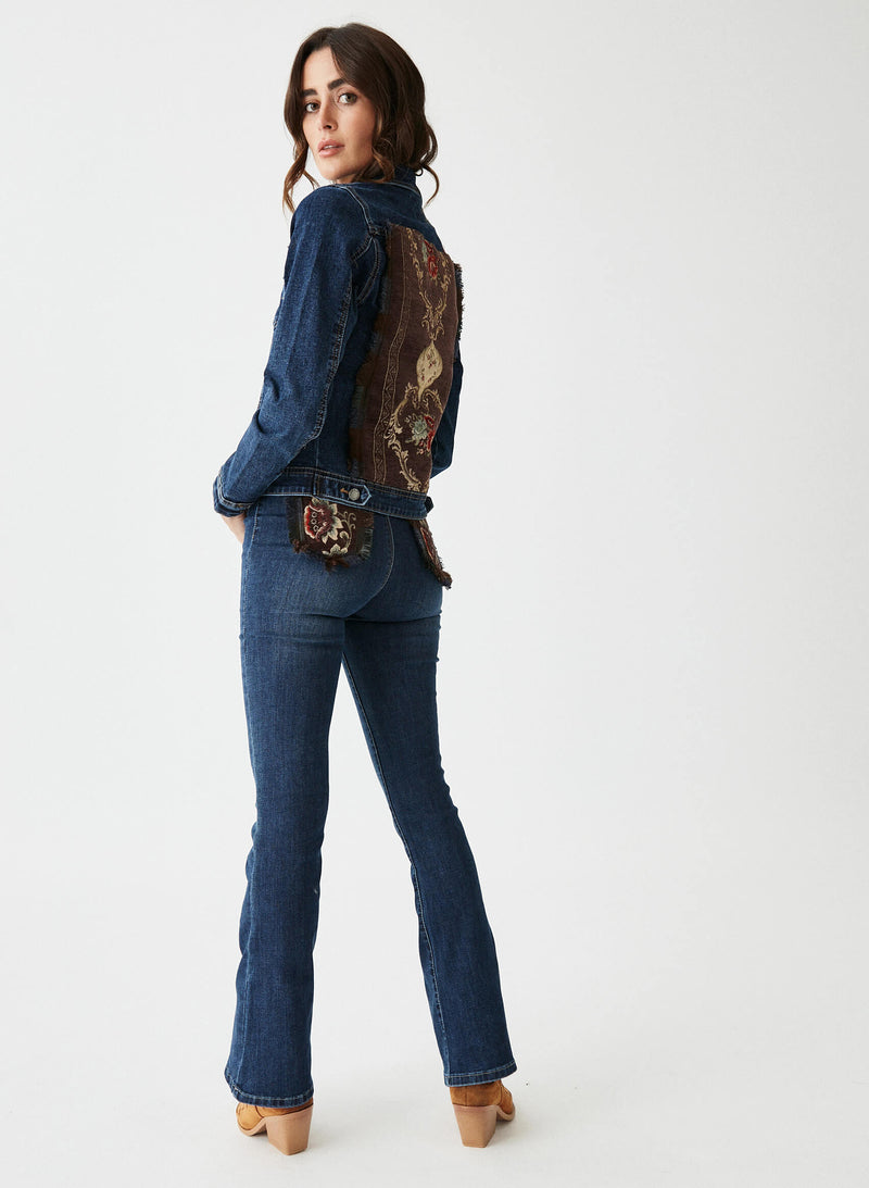 Pantalón denim bolsillos tapicería