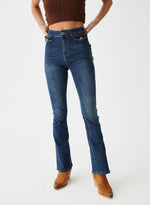 Pantalón denim bolsillos tapicería