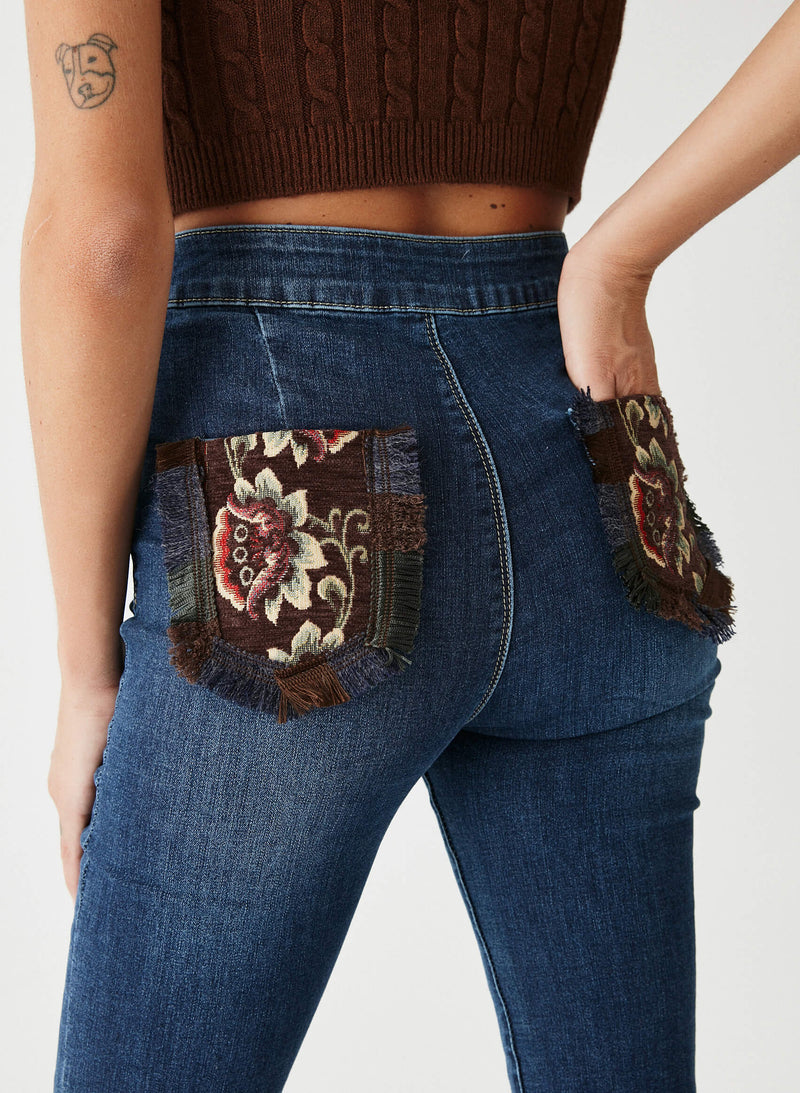 Pantalón denim bolsillos tapicería