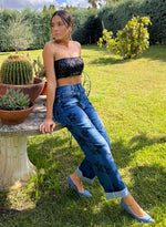 Pantalón denim flores negras piedras
