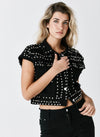 Chaleco denim tachas
