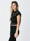 Chaleco denim tachas