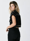 Chaleco denim tachas