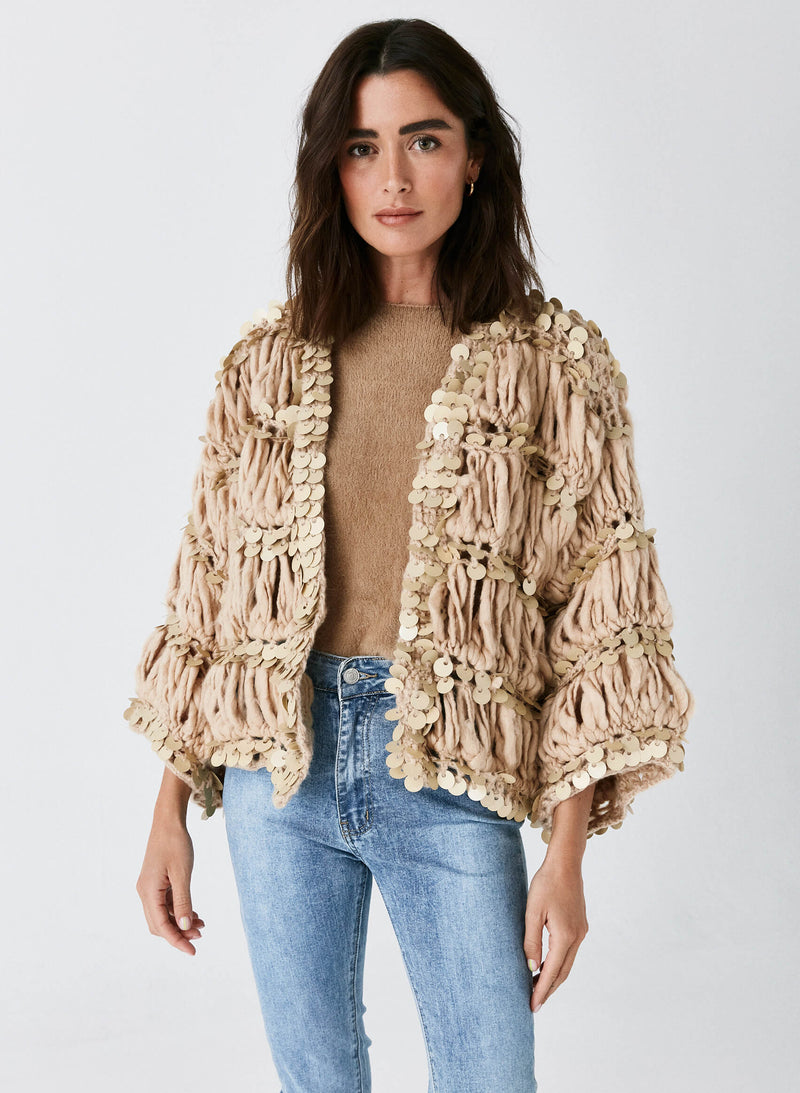 Chaqueta cropped abalorios
